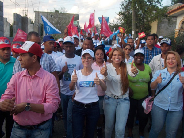 KIMBERLY TAVERAS, CAROLINA MEJIA